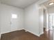 Open foyer with hardwood floors, white trim, and inviting light at 4125 Sugar Pine Ln, Zionsville, IN 46077