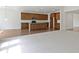 Expansive open living area, showing kitchen, living, and dining spaces, with natural light at 4125 Sugar Pine Ln, Zionsville, IN 46077