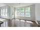 Sunlit living area with large windows and a door to the outside at 4125 Sugar Pine Ln, Zionsville, IN 46077