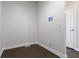 Clean and modern room featuring hardwood flooring and a sleek control panel at 4125 Sugar Pine Ln, Zionsville, IN 46077