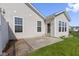 Backyard with a patio, well-maintained lawn, and vinyl siding on the house at 4181 Gordman Dr, Whitestown, IN 46075