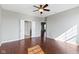 The primary bedroom features hardwood floors, ceiling fan, and a double door entry at 4181 Gordman Dr, Whitestown, IN 46075