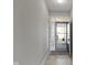 Bright entryway with a neutral color palette, tiled flooring, and a view of the front door and exterior at 4181 Gordman Dr, Whitestown, IN 46075