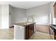 Open concept kitchen featuring an island with sink, and stainless steel appliances at 4181 Gordman Dr, Whitestown, IN 46075