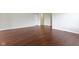 Expansive living room with hardwood flooring, offering versatility for furniture arrangement and design possibilities at 4181 Gordman Dr, Whitestown, IN 46075