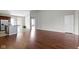 Open-concept living room and kitchen with hardwood floors, ideal for seamless entertaining and modern living at 4181 Gordman Dr, Whitestown, IN 46075