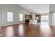 Spacious living room with hardwood floors, large windows, and an open layout, perfect for entertaining at 4181 Gordman Dr, Whitestown, IN 46075