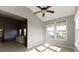 Bright sunroom featuring a view of the kitchen through an adjacent archway at 4181 Gordman Dr, Whitestown, IN 46075