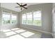 Bright sunroom featuring vaulted ceilings, a ceiling fan, and lots of natural light at 4181 Gordman Dr, Whitestown, IN 46075