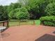 Relax on this expansive back deck overlooking serene green space and lush trees at 4288 Silver Hill Dr, Greenwood, IN 46142