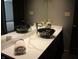 Bathroom vanity with a marble vessel sink and stainless steel faucet at 4288 Silver Hill Dr, Greenwood, IN 46142