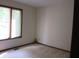Modest bedroom with window at 4288 Silver Hill Dr, Greenwood, IN 46142