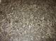 Detailed view of a dark granite countertop featuring intricate patterns and textures at 4288 Silver Hill Dr, Greenwood, IN 46142