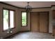 Dining room filled with natural light featuring hardwood trim windows and a sliding glass door at 4288 Silver Hill Dr, Greenwood, IN 46142