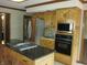 Kitchen with stainless steel appliances, granite countertops, custom cabinetry, and a center island at 4288 Silver Hill Dr, Greenwood, IN 46142