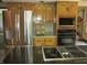 Gourmet kitchen with stainless steel appliances, granite countertops, and center island at 4288 Silver Hill Dr, Greenwood, IN 46142