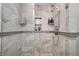 Updated bathroom with tiled walk-in shower featuring a handheld showerhead and convenient built-in niche at 434 Sheffield Ct, Carmel, IN 46032
