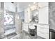 Modern primary bathroom featuring marble countertops, double sinks, and a glass walk-in shower at 434 Sheffield Ct, Carmel, IN 46032