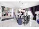 View of the dining area which opens to the adjacent living spaces at 434 Sheffield Ct, Carmel, IN 46032