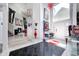 Bright foyer with high ceilings, elegant decor, artistic accents, and black and white tile at 434 Sheffield Ct, Carmel, IN 46032