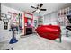Personal gym area with tanning bed, fireplace and displays of trophies and awards at 434 Sheffield Ct, Carmel, IN 46032