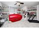 Personal gym featuring a tanning bed, treadmill and many displays of trophies and awards at 434 Sheffield Ct, Carmel, IN 46032