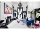 Elegant living room with fireplace, chandelier, stylish furniture, and artistic decor at 434 Sheffield Ct, Carmel, IN 46032