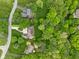 An aerial view showing an expertly manicured lawn and lush greenery surrounding the property at 470 Mill Farm Rd, Noblesville, IN 46062