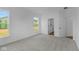 Bright bedroom with plush carpet, natural light, and access to ensuite bathroom at 5032 Carmine St, Brownsburg, IN 46112
