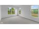 Bedroom featuring plush carpet and large windows allowing natural light at 5032 Carmine St, Brownsburg, IN 46112