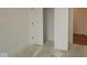 A bedroom featuring white walls and trim, with the door to the closet slightly ajar at 5032 Carmine St, Brownsburg, IN 46112