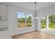 Dining area featuring backyard view and sliding glass door to patio at 5032 Carmine St, Brownsburg, IN 46112