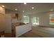 Unfinished kitchen space featuring an island, ample natural light, and neutral tones at 5032 Carmine St, Brownsburg, IN 46112