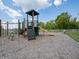 Community playground with slides, climbing structures, and a swing, providing a fun and safe play area at 5203 Cartland Dr, Indianapolis, IN 46239