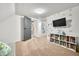 Spacious bedroom with wainscoting and rainbow wallpaper decor at 5335 W 550 S, Trafalgar, IN 46181
