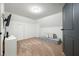 Attic bedroom with gray door, daybed and wainscotting at 5335 W 550 S, Trafalgar, IN 46181