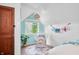 Cozy bedroom space with large window and charming decor at 5335 W 550 S, Trafalgar, IN 46181