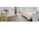 Inviting bedroom with soft carpet, neutral paint, and a cozy reading nook at 5335 W 550 S, Trafalgar, IN 46181