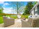 Relaxing outdoor deck area with comfortable seating and scenic backyard view at 5335 W 550 S, Trafalgar, IN 46181