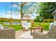 Outdoor deck area with comfortable seating and above ground swimming pool at 5335 W 550 S, Trafalgar, IN 46181