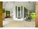 Spacious front porch with rocking chairs, seating, and a welcoming atmosphere at 5335 W 550 S, Trafalgar, IN 46181