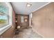 Mudroom featuring natural light, beadboard paneling, and views of the outdoors at 5335 W 550 S, Trafalgar, IN 46181