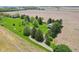Stunning aerial view showcases the property's expansive green spaces and proximity to picturesque farmland at 5758 N 1200 E, Sheridan, IN 46069