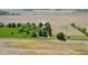 Aerial view with property marker showing location of home, acreage, and surrounding fields at 5758 N 1200 E, Sheridan, IN 46069