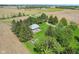 Picturesque aerial view of the home, showcasing lush landscaping, a spacious yard, and serene privacy at 5758 N 1200 E, Sheridan, IN 46069