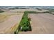 Aerial view of the property nestled between picturesque farmland showcases its serene and private setting at 5758 N 1200 E, Sheridan, IN 46069