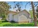 Side exterior view of a home with siding, windows, and a well-maintained lawn at 5758 N 1200 E, Sheridan, IN 46069