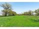Expansive property featuring a picturesque path leading to a charming structure amidst lush greenery at 5758 N 1200 E, Sheridan, IN 46069