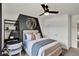 This bedroom provides a decorative basketball light fixture, modern decor, and neutral color scheme at 5931 Sterling Dr, Whitestown, IN 46075