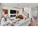 Cozy living room featuring a fireplace, modern lighting, and comfortable seating arrangement at 5931 Sterling Dr, Whitestown, IN 46075